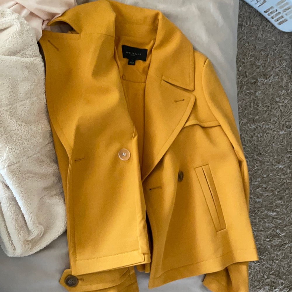 Like new. Umbrella coat sits at waist